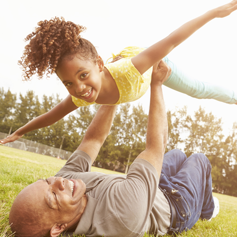 Father playing with his daughter